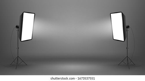 Two glowing softboxes on dark background