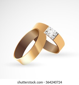 Two gold rings, the concept of wedding, engagement.