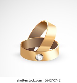 Two gold rings, the concept of wedding, engagement.