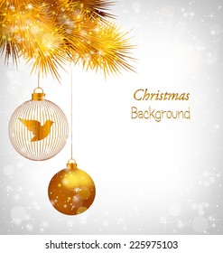 Two golden balls with bird and golden pine branches in snowfall on grayscale background