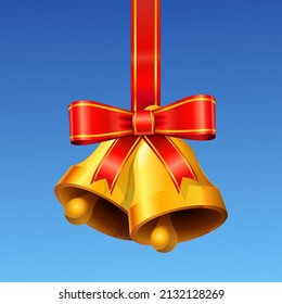 Two golden bells hung by a knot on a red ribbon with a blue sky in the background