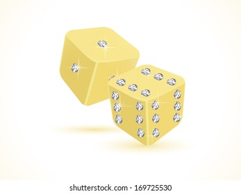 Two golden dices on white background