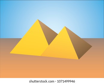 Two golden pyramids of Cairo in desert under blue sky