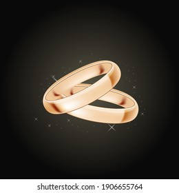 Two golden rings on black background