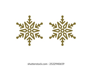 Two golden snowflakes on white background. Symmetrical winter ornament. Christmas and holiday decoration concept for greeting card and print