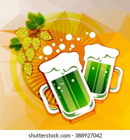 Two green beer glasses and hop on a beer color background.