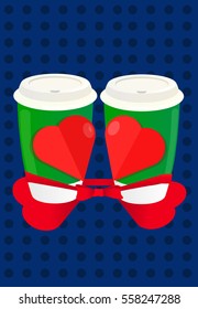 Two green cups with a bow and two red hearts. Gift for Valentine's Day. On a blue background with dots 