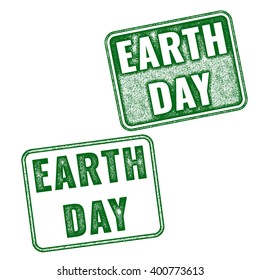 Two green realistic vector Earth Day grunge rubber stamps isolated on white background