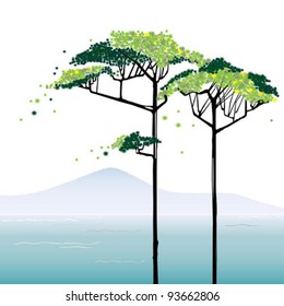Two green trees on an abstract background with mountains