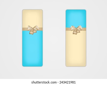 two greeting cards with ribbon and bow on gray background