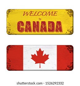 Two grunge boards with Canada flag and welcome text isolated on white background