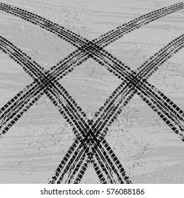 Two grunge tire tracks isolated on dirty background