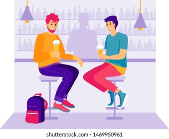 Two guys are drinking beer at the bar. Pair of happy friends sitting on stools at bar counter and drinking beer or alcoholic beverages. Two cute funny smiling young men in pub. Friendly meeting. 