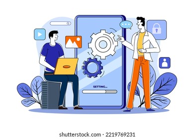 Two guys are setting up the application logic
