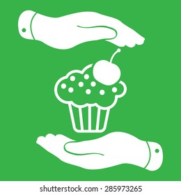 two hands with badge with white cake icon and cherry on the green background - vector illustration