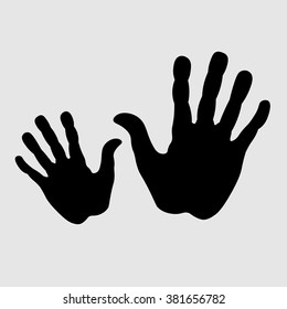 Two hands in black 
Two hands in black on a white background a children's hand another adult for design and decoration
