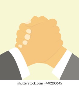 two hands clasped each other strongly