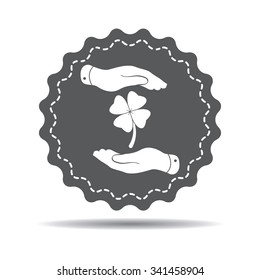 two hands with Clover with four leaves sign icon on a white background. Saint Patrick symbol