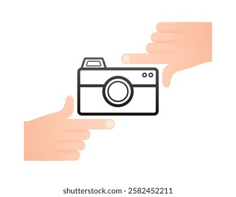 Two hands framing a camera icon, taking a photo concept