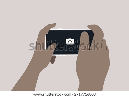 Two hands grip a mobile phone camera, ready to capture a beautiful moment in a calm atmosphere, showcasing the artistry of everyday life and the joy of creative expression.