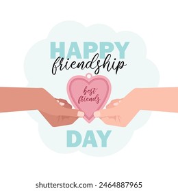 Two hands with a heart-shaped pendant and the inscription Happy Friendship Day 