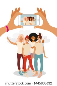 Two hands hold a martphone and take a photo of a group of teenage girls. Group photo of friends on your phone screen. Cartoon vector illustration on isolated white background.
