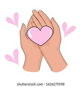Two hands holding a heart on a white background isolated for Valentine's day