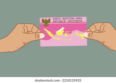 Dos manos con KIA, tarjeta de identidad para niños en Indonesia. Traducción: Tarjeta de identidad infantil. República de Indonesia