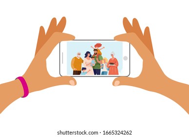 Two Hands Are Holding A Phone With A Family Photo On The Screen. Photo Of A Large Family Using Modern Technology. Flat Cartoon Vector Illustration