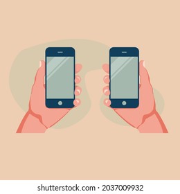 dos manos sostienen el teléfono que está apagado