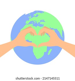 Two hands make a heart sign in front of the planet Earth. The concept of love and care for the Earth