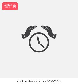 Two hands protecting or giving a clock