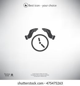 Two hands protecting or giving a clock