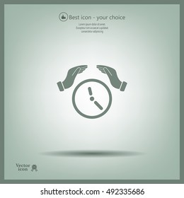 Two hands protecting or giving a clock