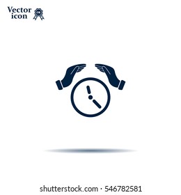 Two hands protecting or giving a clock