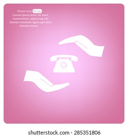 Two hands protecting or giving a phone