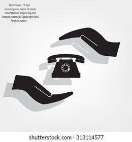 Two hands protecting or giving a phone
