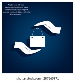 Two hands protecting or giving a shopping bag