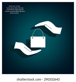 Two hands protecting or giving a shopping bag