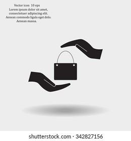 Two hands protecting or giving a shopping bag