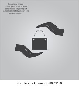 Two hands protecting or giving a shopping bag