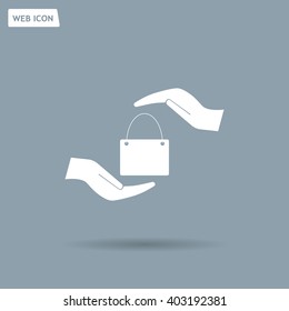 Two hands protecting or giving a shopping bag