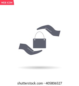 Two hands protecting or giving a shopping bag