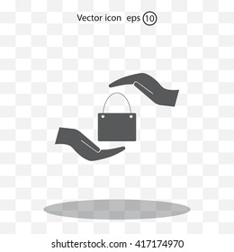 Two hands protecting or giving a shopping bag