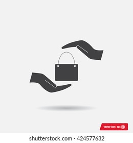 Two hands protecting or giving a shopping bag