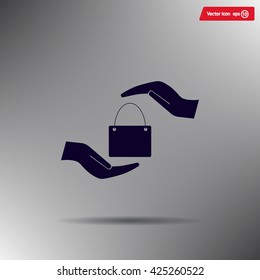 Two hands protecting or giving a shopping bag