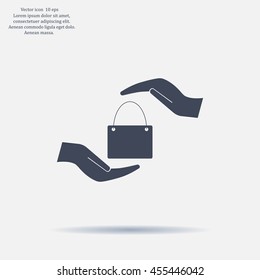 Two hands protecting or giving a shopping bag