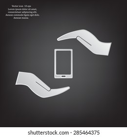 Two hands protecting or giving a smart phone