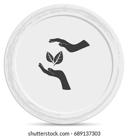Two hands protecting a leaf.
