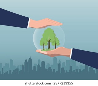 Two hands protecting trees.environmental protection.
